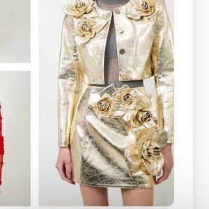Designer NEW
The Aksel skirt in gold  Gold Metallic Skirt with Floral Detail